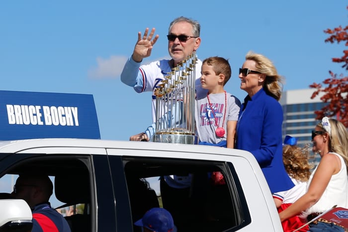 Nov 3, 2023; Arlington, TX, USA; Texas Rangers manager Bruce Bochy waves with the championship trophy during the World Series championship parade at Globe Life Field. Mandatory Credit: Andrew Dieb-USA TODAY Sports